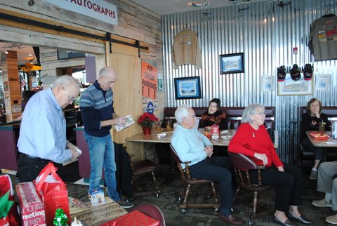 Eric opening the first gift